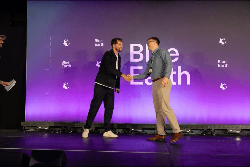 Ontra Mobility’s BE100 category win is celebrated on stage at Blue Earth Summit